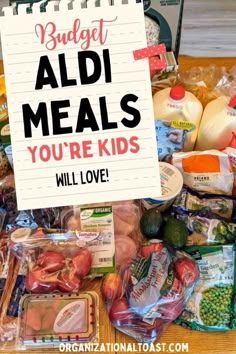 a sign that reads budget aid meals you're kids will love next to some food