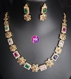 Premium quality Multi-color AD/CZ stone Flower design Necklace with cute Earrings - Gold Jewelry Replica Haram - MK Fashionkart Material:  Premium Polish with AD/CZ Stones Earrings: Matching Earrings Suitable for Saree/Salwar/party wear dresses Adjustable length    SHIPPING : Ready to ship in 1 business day. This item will be shipped from The United States. Jewelry care instructions : 1. Please wipe the jewelry with a piece of cotton cloth after usage.  2. Store the jewelry in a cool, dry and ai Multicolor Cubic Zirconia Jewelry For Celebration, Multicolor Flower Shape Jewelry For Party, Multicolor Flower Jewelry For Wedding, Multicolor Party Jewelry With Flower Shape, Multicolor Flower-shaped Wedding Jewelry, Multicolor Flower Shape Party Jewelry, Multicolor Flower Jewelry Set With Matching Earrings, Multicolor Flower Shaped Jewelry With Matching Earrings, Multicolor Flower Jewelry With Matching Earrings