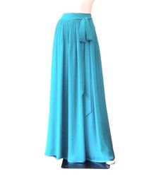 "It is made from soft and good quality Chiffon fabric. This is made to order in your measurements. Skirt length: 38\" .It can be made longer or shorter. It is made with a zipper. You can choose other color from the color chart. When you order please give me your measurements: 1: The length of skirt from the top of the waistline to bottom hem . 2: Waist ( where you want the waistline to be) . 3: Hips ( around the fullest part) 4: And your color choice. Tailoring time: 1-2 weeks before shipping. C Flowy Blue Maxi Skirt With Gathered Details, Flowy Blue Maxi Bottoms, Blue Maxi Length Party Bottoms, Blue Maxi Length Bottoms For Party, Elegant Blue Maxi Skirt, Fitted Blue Elegant Wrap Skirt, Elegant Full Length Blue Skirt, Blue Chiffon Pleated Maxi Skirt, Blue Pleated Chiffon Maxi Skirt