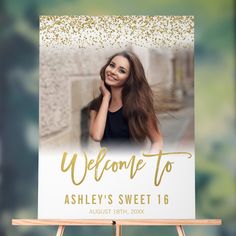 a welcome sign with a photo on it and gold glitters in the background that says, welcome to ashley's sweet 16 august 18th