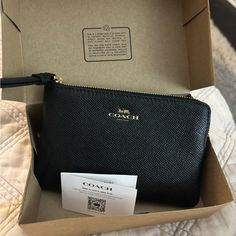 Brand New Black Coach Wristlet. Great Size For Phone And Id. Size Is 4x6 In Everyday Coach Pouch, Elegant Coach Coin Purse With Zipper, Black Wristlet With Zipper Closure As Gift, Coach Coin Purse With Zipper Closure As Gift, Black Wristlet With Zipper Closure For Gift, Elegant Black Coin Purse With Zipper, Everyday Black Coach Wallet, Chic Black Coach Wristlet, Coach Mini Purse