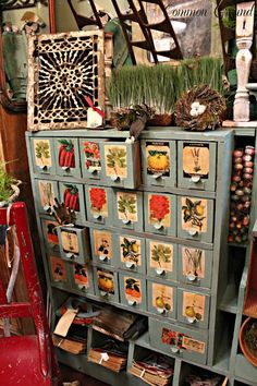 an old dresser with many different things on it's drawers and shelves in a store