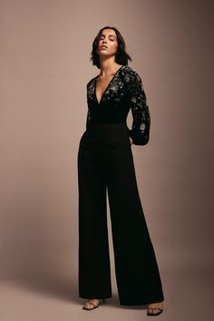 Style: JumpsuitFabric: VelvetLength: RegularNeckline: V NeckSleeve Length: Long Sleeve Prom Jumpsuits Women, Party Jumpsuits For Women, Diwali Party Outfit, Black Tie Jumpsuit, Party Wear Jumpsuit, Officiant Attire, Formal Party Outfit, Evening Wear Jumpsuits, Black Long Sleeve Jumpsuit