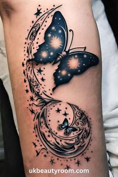 a woman's thigh with a butterfly and stars tattoo on the side of her leg