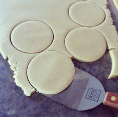 the dough has been cut into circles and is ready to be baked