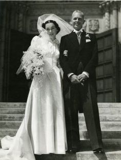 an old black and white photo of a bride and groom