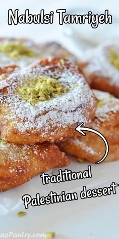 squares of dough stuffed with pudding, topped with powdered sugar and crushed pistachios. With Pinterest overlay. Vegan Arabic Dessert, Arab Desserts Recipes, Ramadan Sweets Arabic Dessert, Ramadan Dessert Ideas, Arabic Food Traditional, Syrian Dessert, Arab Desserts, Mediterranean Sweets