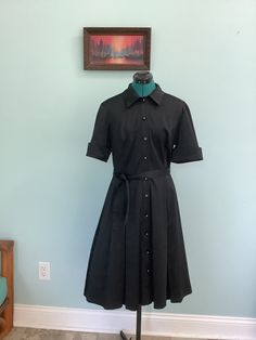 Beautiful Vintage 2K Shirtwaist Dress by Connected 50's Fit an Flare style Satin finish of Polyester,Cotton, and Spandex Short cuffed sleeves with a split vent  (10) Button front with beautiful vintage buttons  Fitted waist with a few pleats on skirt attached  Matching fabric belt  Size 12 -14 Shoulders - 17 1/2" Sleeves-11" Bust -42" Waist -34" Hip - Free Length - 42" Awesome dress ~ no damages ~ very little wear 1940 Shirtdress, Fernandina Beach, Shirtwaist Dress, Spandex Shorts, Fabric Belt, Vintage Buttons, Cuff Sleeves, New Girl, Dress Clothes For Women