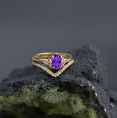 AAA+ purple amethyst shines so beautifully in this timeless ring! The ring could be 14K solid gold or 925 silver according to your preference. Dainty shape and style with 6 tiny natural blue tanzanites are so gorgeous!  You will love it! :) ♥ Please note as with all natural gemstones the color and inclusions may vary slightly from the pair shown. ♥ QUALITY: Each item is stamped according to US regulations.  ♥ Hypoallergenic silver that is skin friendly ♥ Each order will be gift wrapped beautifully ------   *DIMENSIONS*  ------ ♥ This ring will be made to order Face dimensions: 13x7 mm Main Metal: 925 Sterling Silver (14K gold) Main Stone:  purple amethyst Stone dimensions: 7x5mm; 1.7 mm Treatment: Not Enhanced Stone Origin: Africa Secondary Stones: Blue Tanzanite  or White Topaz - all natu Face Dimensions, February Birthstone Jewelry, Timeless Ring, Purple Amethyst Ring, Blue Tanzanite, February Birthstone, 925 Silver Ring, February Birth Stone, Amethyst Stone