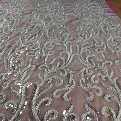 Price: The price is for 1 yard. if you buy more than 1 yard ,it won't be cut. will come in one piece the longest is 20 yards. Material: polyester,pearls,sequins,beads Fixed Wide : 110cm or 43 inches. color:off white,silver Want to see other colors and more similar Beading lace fabrics come to: https://www.etsy.com/shop/Randyfabrics?ref=hdr_shop_menu&section_id=14192305 Shipping: Choose the shipping way you need, if you want package shipped by express,please note the phone number on order. Us Elegant Silver Embroidered Fabric For Wedding, Elegant Silver Embroidered Fabric With Lace Work, Elegant Silver Lace With Sequins, Elegant Silver Lace With Intricate Embroidery, Elegant Silver Lace Embroidered Fabric, Elegant Silver Embroidered Lace Fabric, Elegant Silver Lace Tulle Fabric, Elegant Silver Sequin Fabric With Pearl Embroidery, Off White Wedding Dresses