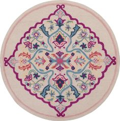 a round rug with an ornate design on the center and sides, in various colors