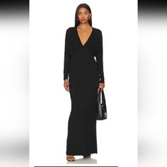 Never Fully Dressed Absolutely Stunning! Long Sleeve Black Maxi Dress. Plunging V Neck With Ruched Middle. Fitted At Bodice And Flares Out At Bottom. Super Stretchy, Thicker Fabric. Womens Size 6 New With Tags! Closet Clear Out! Bundle Any Items Priced $25 Or Under For One Of The Following Discounts.... 3 For $25 Plus Shipping 6 For $50 Plus Shipping 9 For $75 Free Shipping Free Surprise Gifts With Every Bundle Purchase! Long Sleeve Black Maxi Dress, Dolly Shirt, Bandana Dress, High Neck Maxi Dress, Never Fully Dressed, Tie Maxi Dress, 50 Plus, Sleeve Maxi Dress, Black Maxi