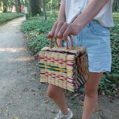 Colorful Bag Artisan Made Made in Portugal Dimensions: L - 17 cm, W - 12 cm, H - 15 cm  L - 6,7 in, W - 4,7 in, H - 5,9 in The dimensions of the bag may vary slightly. Multicolor Woven Bucket Bag As Gift, Multicolor Woven Bucket Bag Gift, Multicolor Handheld Bag For Gift, Multicolor Shoulder Box Bag For Mobile Phone, Multicolor Square Box Bag For Mobile Phone, Multicolor Bucket Bag With Removable Pouch As Gift, Multicolor Woven Shoulder Bag As Gift, Casual Rectangular Box Bag For Gift, Summer Multicolor Rectangular Satchel