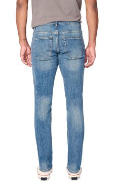 A distressed medium wash renders a laid-back vibe in a pair of slim-fit jeans that effortlessly retain their shape while also offering stretch. Zip fly with button closure Five-pocket style 92% cotton, 7% polyester, 1% Lycra® spandex Machine wash, dry flat Imported Distressed Fitted Medium Wash Jeans, Distressed Fitted Jeans In Medium Wash, Slim Fit Medium Wash Jeans, Medium Wash Slim Fit Jeans, Light Wash Fitted Jeans, Distressed Slim Fit Straight Leg Bottoms, Distressed Medium Wash Tapered Leg Jeans, Casual Slim Fit Medium Wash Jeans, Casual Slim Medium Wash Jeans