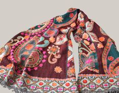 Amazing handmade embroiderd shawl. Colorful woolen indian scarf. + Unique and exclusive embroidered shawl for a ceremony, wedding or party. +` Fully embroidered by hand with a floral design and in very bright colors' + Great accessory to any dress and occasion.  + Fabric:           100% wool Size:               70cm x 200cm // 27,3" x 78" Dry clean + Note that the colors of the original product may vary slightly from those you see on the computer screen. For any questions you may have contact wi Indian Scarf, Boho Shawl, Embroidered Shawl, Embroidered Wool, Ceremony Wedding, Wedding Shawl, Idea Gift, Wool Shawl, Colorful Boho