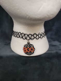 I love the aesthetic of this necklace. It is adjustable to different neck sizes. Gothic Round Adjustable Necklace, Gothic Adjustable Round Necklace, Vintage Adjustable Choker Necklace, Gothic Adjustable Necklace For Halloween, Gothic Halloween Adjustable Necklace, Festival Choker Necklaces With Adjustable Cord, Trendy Metal Choker For Halloween, Festival Choker Necklace With Adjustable Cord, Handmade Choker Necklace For Halloween