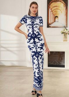 This Short Sleeve Printed Maxi Dress features a traditional Chinese print on a pencil shaped design. The round neck and invisible zipper on the back add practicality to its stylish look. Made with knitted fabric, this dress offers comfort and versatility. Perfect for summer outings or special occasions. Fabric: High Stretch Material: Polyester, Elastane Fitted Short Sleeve Patterned Maxi Dress, Fitted Patterned Maxi Dress With Short Sleeves, Fitted Floral Print Dress With Crew Neck, Elegant Blue Crew Neck Dress, Chinese Prints, Open Back Maxi Dress, Embellished Maxi Dress, Lace Top Long Sleeve, A Pencil