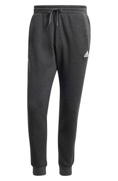 Wrap yourself in cozy joggers crafted from supersoft mélange with subtle branding that sit in a sweet spot between lounge-ready and outdoor adventuring. Front slant pockets 70% cotton, 30% recycled polyester Machine wash, line dry Imported Nordstrom Rack, Lounge, Nordstrom, Branding, Adidas