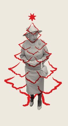 a woman standing in front of a christmas tree with red thread on the top and bottom