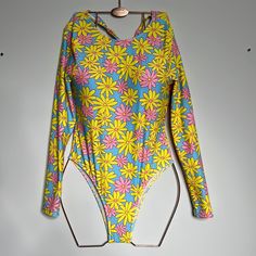 Shein Xs Pink, Blue And Yellow Floral One Piece Swimsuit With Long Sleeves Nwot Has Sanitary Liner Yellow Beachwear Bodysuit For Swimming, Spring Multicolor Bodysuit For Poolside, Yellow Printed Bodysuit For The Beach, Yellow Stretch Swimwear With Floral Print, Yellow Printed Beachwear Bodysuit, Spring Blue Printed Bodysuit, Blue Printed Bodysuit For Spring, Spring Green Printed Bodysuit, Casual Blue Floral Print Bodysuit