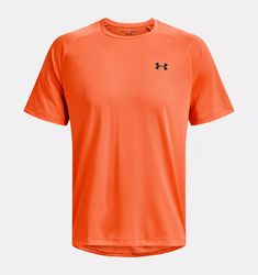 an orange t - shirt with the under armour logo on it, and black lettering