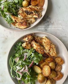 two plates with chicken, potatoes and greens on them