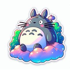 a sticker with a totoro sitting on top of some clouds in the sky