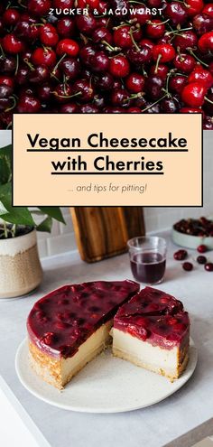 a cheesecake with cherries is on a plate