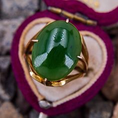 This fantastic hand fabricated ring features an oval cabochon cut nephrite jade with textured detail the prongs. The ring is crafted in 14k yellow gold with a great patina, and had a high carat gold wash at some point. This ring is currently a size 5.5. Nephrite Jade, Patina Finish, Jade Ring, Gold Wash, Vintage Bracelets, Oval Cabochon, Patina, Jade, Hand Made