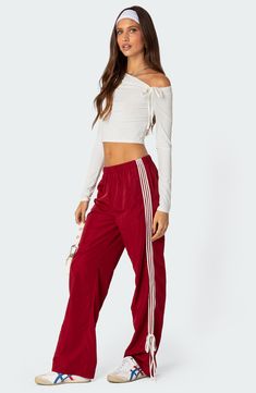 This stretchy shoulder-baring top is designed in a cropped silhouette with rippled, ruched accents. One-shoulder neck Long sleeves 95% polyester, 5% spandex Machine wash, dry flat Imported Ohio State Gameday Outfit, Kyunghee University, Gameday Fits, Super Bowl Outfit, Track Pants Outfit, Gameday Outfits, Fit Board, Visionary Fashion, University Outfit