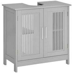 a white cabinet with two doors and drawers