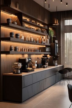 a modern coffee shop with lots of counter space and shelves filled with cups, saucers, and other items