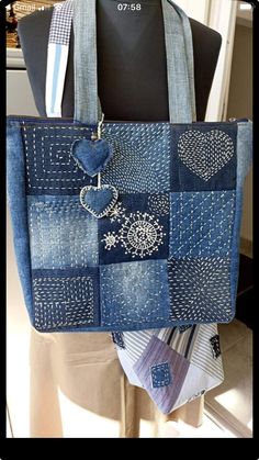 a handbag made out of old jeans