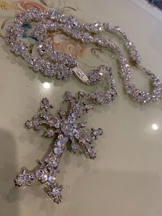 Crystal Rhinestone Cross Pendant Jewelry, Crystal Cross Pendant With Rhinestones, Crystal Cross Pendant Jewelry With Rhinestones, Elegant Crystal Cross Rhinestone Necklace, Elegant Crystal Rhinestone Cross Necklace, Crystal Cross Jewelry With Rhinestones, Crystal Rhinestone Cross Jewelry, Silver Crystal Cross Pendant Necklace, Elegant Cross-shaped Rhinestone Necklace For Parties