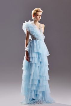 Description Light Blue A-line, Long dress Sleeveless Open neckline One Shoulder Tulle, Embroidery Dry Clean Evening Dress Made in Lebanon GCS 1528 Tiered Tulle Dress, Blue Tulle Dress, Tulle Embroidery, Blue Tulle, Layered Skirt, Lace Embroidery, Dress Sleeveless, Tulle Dress, Lebanon