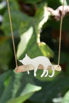 White cat on a swing pendant, Statement necklace, Pet lovers gift, Gift for a cat lover, love for pets, Short necklace, pet lover necklace, acrylic cat pendant, black kitten, cute cat necklace, crazy cat lady gift, original gift for her. This adorable, statement necklace is made with laser cut technique from Acrylic (plexiglass) and brass.  The cat necklace started as an original drawing of mine and was then transformed into this whimsical, original necklace which I assemble myself. This necklac Crazy Cat Lady Gifts, Tiger Necklace, Gatto Carino, Lover Necklace, Kitten Cute, Original Necklace, Cat Lady Gift, Cat White, Lover Jewelry