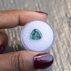 This loose stone is available for a custom ring by Anueva Jewelry. Select your stone first and then select a setting. Add both to your cart and we'll create your ring! 4.66CT TRILLION MONTANA SAPPHIRE, SILKY TEAL GREEN, 10.38X9.70X5.85MM, UNHEATED. Color shifts from teal-blue to teal-green, depending on the source of light available. The sapphire was mined in Montana, USA and is a rare, larger size! It would be great in a Mountainscape setting with antique diamonds on either side. Some visible s Emerald Cut Green Gemstones With Accent Stones, Fine Jewelry Green Round Cut Gemstones, Trillion Cut Green Emerald Jewelry, Green Trillion Cut Emerald Jewelry, Green Gia Certified Trillion Cut Jewelry, Gia Certified Trillion Cut Green Jewelry, Trillion Cut Emerald Jewelry In Green, Gia Certified Green Gemstones For Anniversary, Gia Certified Green Gemstones Fine Jewelry