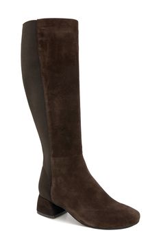 A stretchy back panel offers a comfortable fit on a knee-high boot grounded by a cushioned footbed and durable rubber sole. 1 3/4" heel 15 1/4" shaft; 9 1/4" calf circumference. Narrow calf Side zip closure Memory foam cushioning PORON®-cushioned insole with arch support Leather upper and lining/rubber sole Imported Long Brown Boots, Chocolate Brown Boots, Mens Shoes Black, Chocolate Leather, Sneaker Dress Shoes, Boot Brands, Tall Boots, Kenneth Cole, Brown Boots