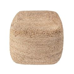 a large round poufce made out of jute, on a white background