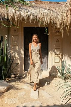 Desert Sage Fringe Maxi Boho Dress.Long Bamboo Dress is a divine artefact from our new collection. The silhouette is floaty and simple, with two slits on the sides – so that the dress looks very classy and elegant. Fringe decoration on the v-neck and amazing long belt with fringes adds original boho chic accent, that w Elegant Beige Boho Maxi Dress, Long Dresses With Side Slits For Vacation, Long Vacation Dress With Side Slits, Long Midi Dress With Side Slits For Vacation, Chic Beige Maxi Dress With Side Slits, Chic Split Midi Dress For Beach, Bohemian Floor-length Dress With Side Slits, Elegant Split Dresses For Summer, Maxi Length Dress With Side Slits