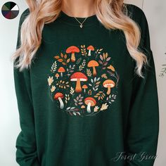 Mushrooms and Leaves Unisex Crewneck Sweatshirt | Cottagecore Jumper | Nature Forest Lover Jumper  ✔️ Super comfy unisex heavy blend crewneck sweatshirt  ✔️ 50% cotton 50% polyester ✔️ Medium-heavy fabric (8.0 oz/yd² (271.25 g/m ✔️ No side seams ✔️ Ribbed knit elastic collar to help collar retain its shape ✔️ Sewn-in label 📏 Runs true to size ✨ Care instructions: Machine wash: cold (max 30C or 90F). Turn inside out before washing to protect the print. Non-chlorine: bleach as needed. Tumble dry: Cottagecore Jumper, Boho Mushroom, Clothes Cottagecore, Autumn Jumpers, Cottagecore Fall, Boho Sweatshirt, Cottagecore Clothes, Lover Clothes, Nature Forest