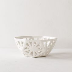 White geometric fruit bowl. Pentagon carved design with additional carved designs in the shape of slim right angle triangles. Close up detail images focusing on carving design. Designed and sold by Convivial Production, Kansas City Ceramics Modern Fruit Bowl, Ceramic Fruit Bowl, Stoneware Dishes, Porcelain Clay, Ceramic Design, Architectural Design, Fruit Bowl, Cut Outs, Handmade Ceramics