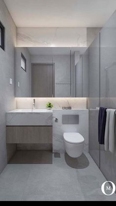 a bathroom with a toilet, sink and mirror