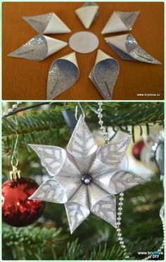 christmas ornaments made out of silver and white paper