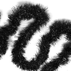 a black and white photo of the word seo spelled out in fake tinsels