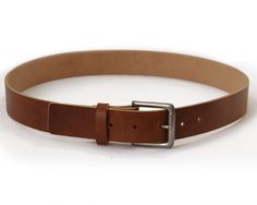 "Minimal and made of the finest materials, this medium brown belt is a unique take on a classic necessity. Made of thick 9oz vegetable-tanned leather, and finished with solid brass nickel-plated trim, this belt was designed to last a lifetime. And hand-dyed, the lustrous brown surface contrasted against the natural edges and underside creates a unique flair. If you're going to invest in an everyday classic brown belt, make it memorable with what will surely become a lifetime investment. - Size: Natural Edges, Tan Leather Belt, Beautiful Belts, Classic Brown, Veg Tan Leather, Brown Belt, Gifts For My Boyfriend, Brass Buckle, Medium Brown