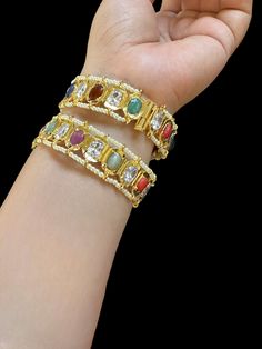 Ready to ship bangles gold plated openable with screw Ruby stones used Fit’s size 2.4,2.6,2.8 Jeweled Kundan Bangle In Fusion Style, Jeweled Kundan Fusion Bangle, Fusion Style Jeweled Kundan Bangle, Festive Fusion Bangle With Stone Setting, Gold Kundan Fusion Bangle, Multicolor Stone Setting Bangle Jewelry, Fusion Style Jeweled Bangle Jewelry, Fusion Style Jeweled Gold Bracelets, Elegant Gold Bangle With Multi-stone Details