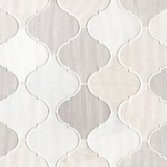 a white and grey wallpaper with an intricate design