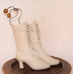 Request a Custom Order and have something made just for you! Your customised Victorian Boots size for strong calf, wider feet and narrow feet also. This is an individual boot execution 100% hand made in leather and lined in suede leather All materials very qualitative. Off White grainy leather lined with suede leather inside. Are issued by limited series. Model inspired from 1900 boot style. Mid calf height: Height of the Heel 2.6" inch/ 7 cm Heel can be Shorter by request length of the boot fro Historical Formal Boots With Leather Sole, Victorian Boots With Leather Sole For Formal Wear, Victorian Formal Boots With Leather Sole, Formal Victorian Boots With Leather Sole, Historical Round Toe Formal Boots, Historical Round Toe Boots For Formal Occasions, Historical Formal Boots With Round Toe, Vintage Fitted Lace-up Boots With Snip Toe, Victorian Leather Boots For Formal Occasions