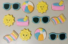 decorated cookies with sun, sunglasses and beach items